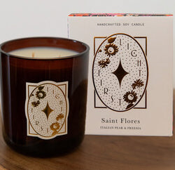 Introducing our limited edition Saint Flores Soy Candle in Italian Pear and Freesia – the perfect addition to your home or as a thoughtful gift for someone special.