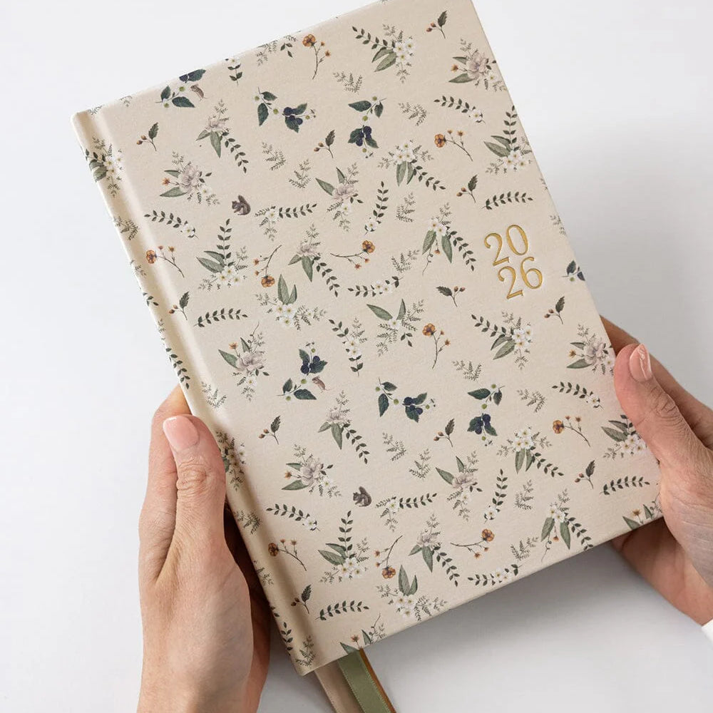 Beautiful linen bound 2026 Day to a Page planner