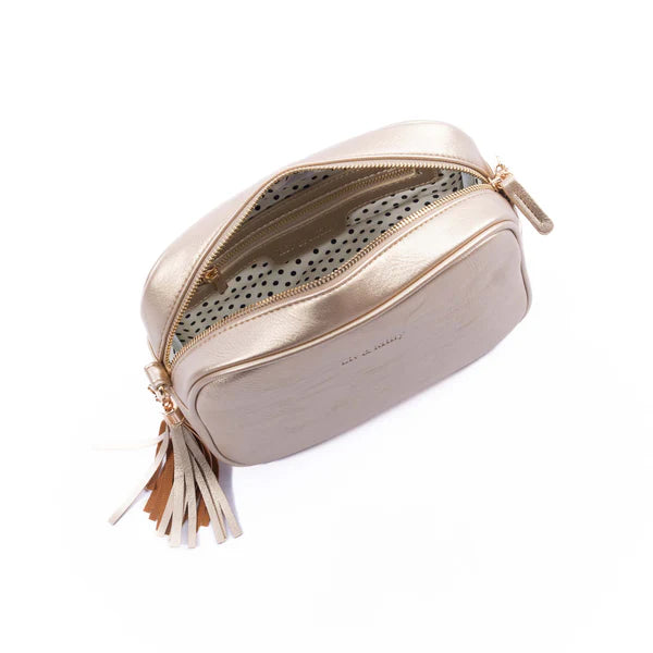 The Liv & Milly Sally in Gold is a classic & versatile crossbody bag crafted from a gorgeous soft vegan leather.