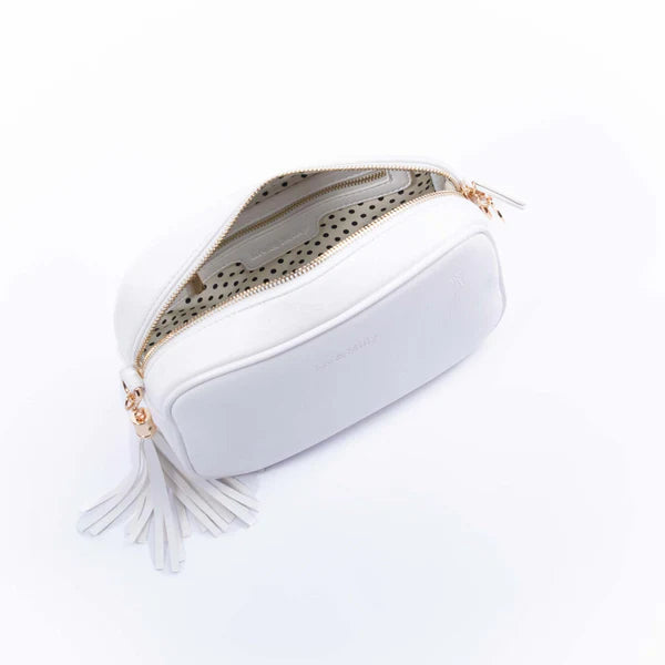 The Liv & Milly Sally in White is a classic & versatile crossbody bag crafted from a gorgeous soft vegan leather