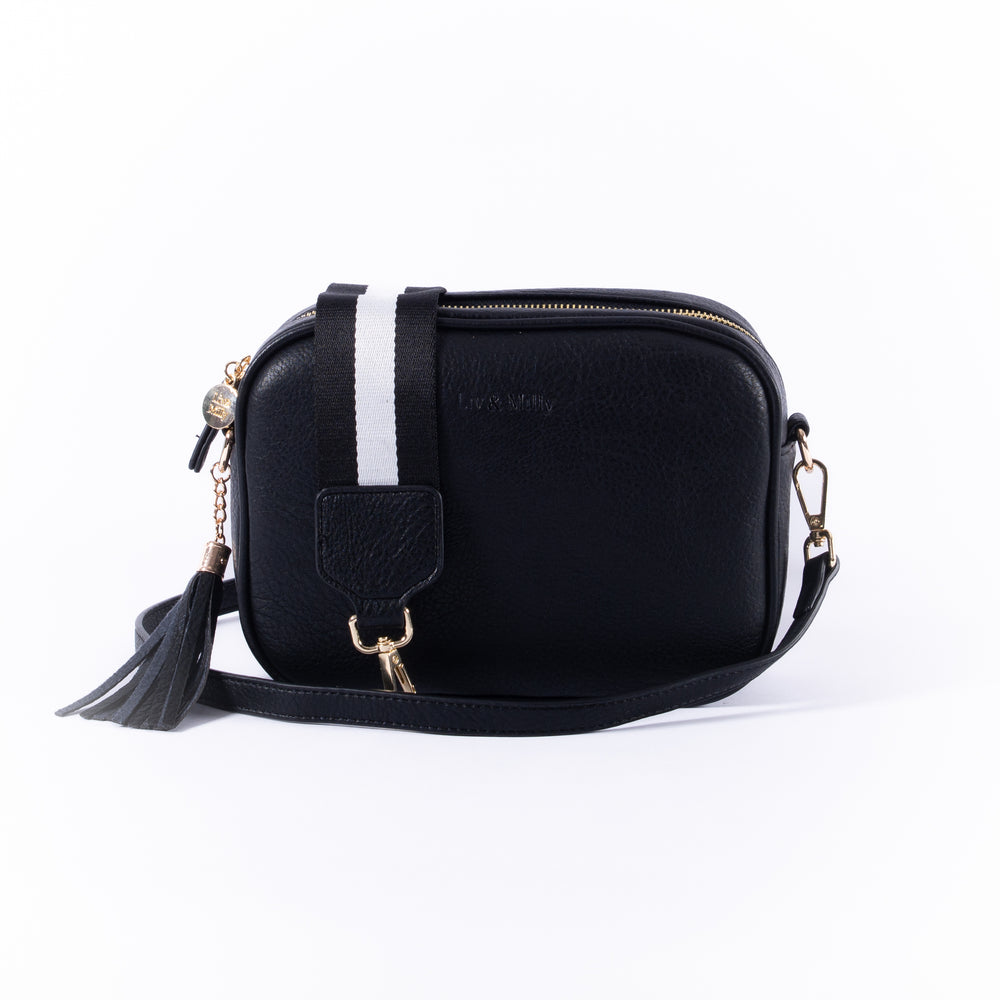 The Liv & Milly Sally in Tan is a classic & versatile crossbody bag crafted from a gorgeous soft vegan leather.