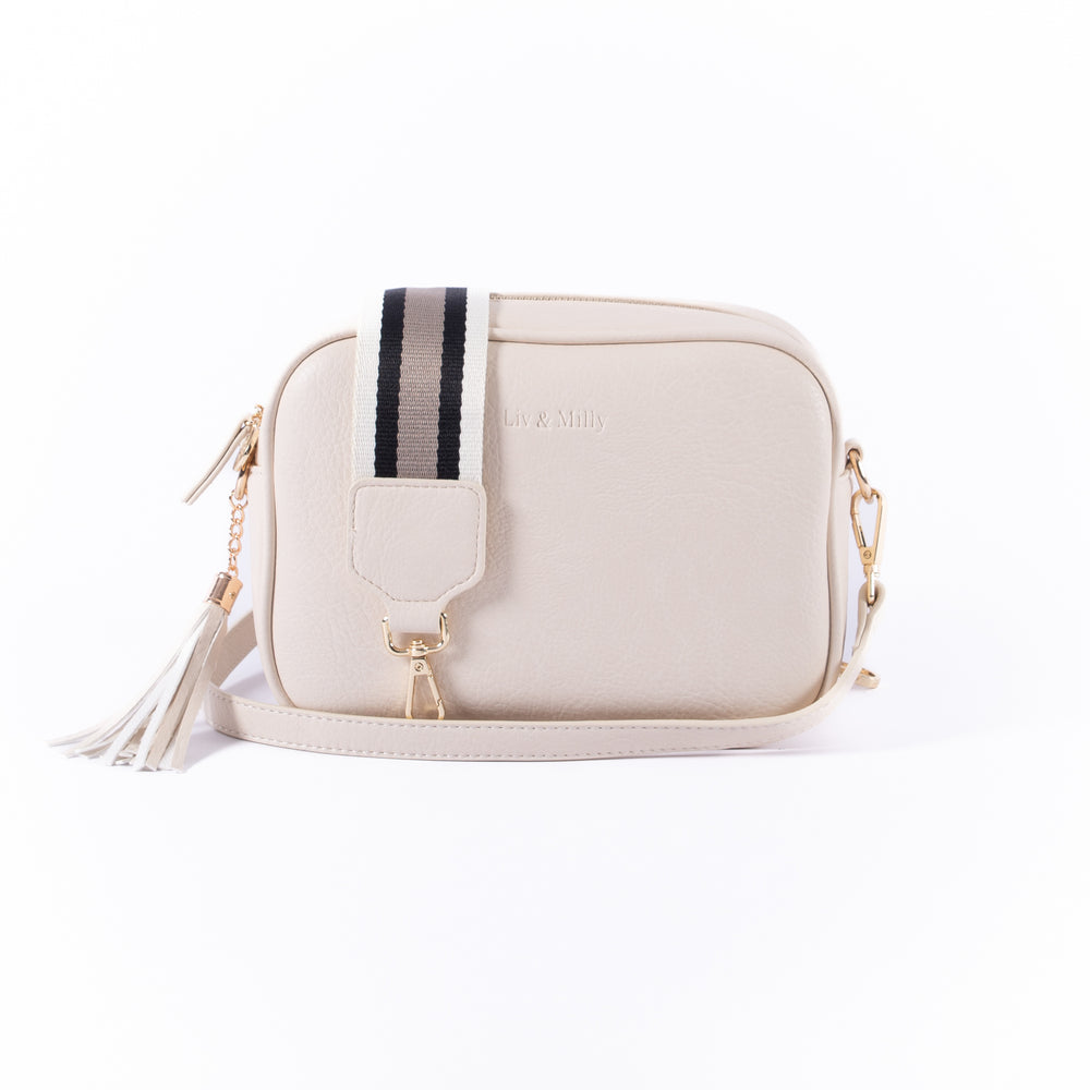 The Liv & Milly Sally in Cream is a classic & versatile crossbody bag crafted from a gorgeous soft vegan leather.