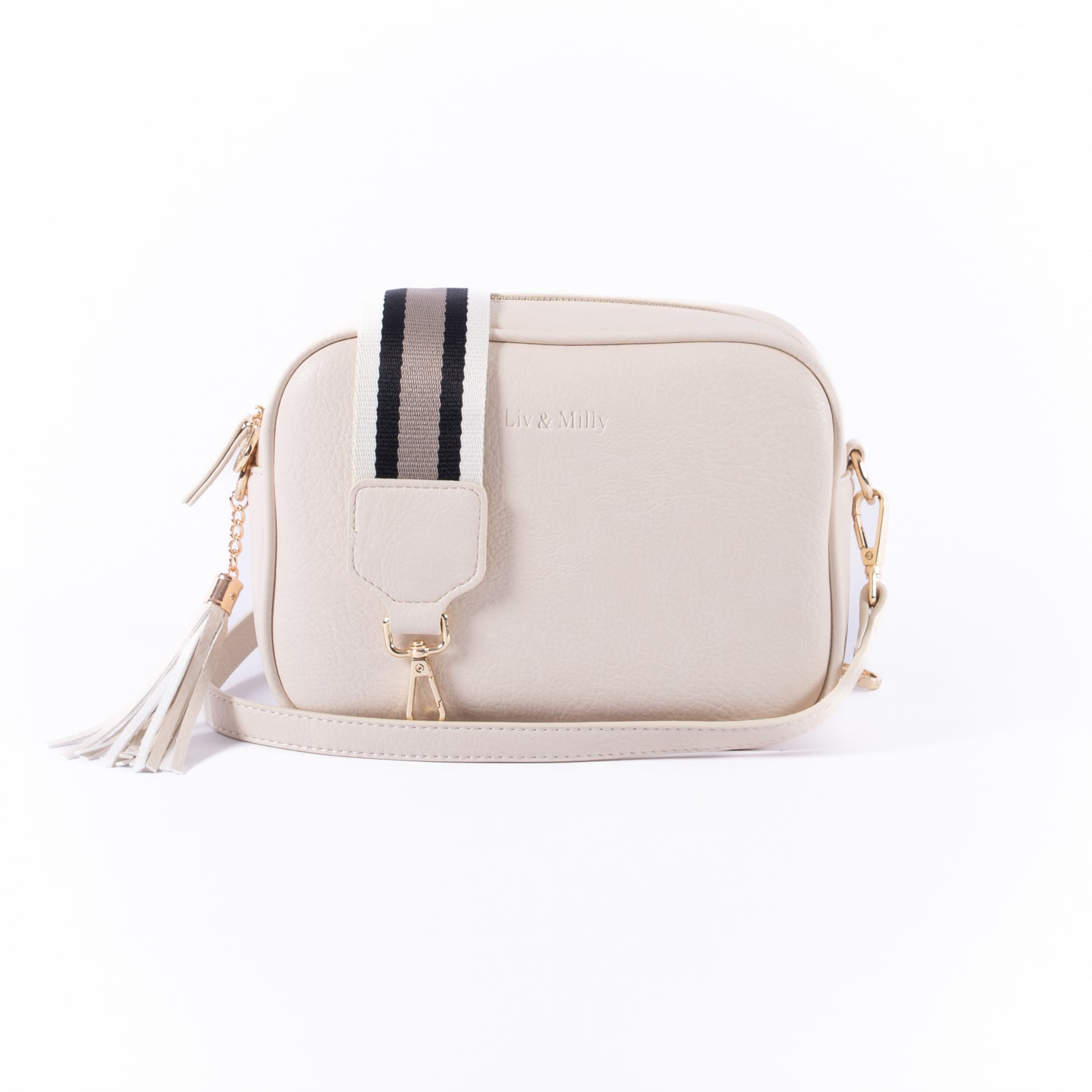 The Liv & Milly Sally in Cream is a classic & versatile crossbody bag crafted from a gorgeous soft vegan leather.