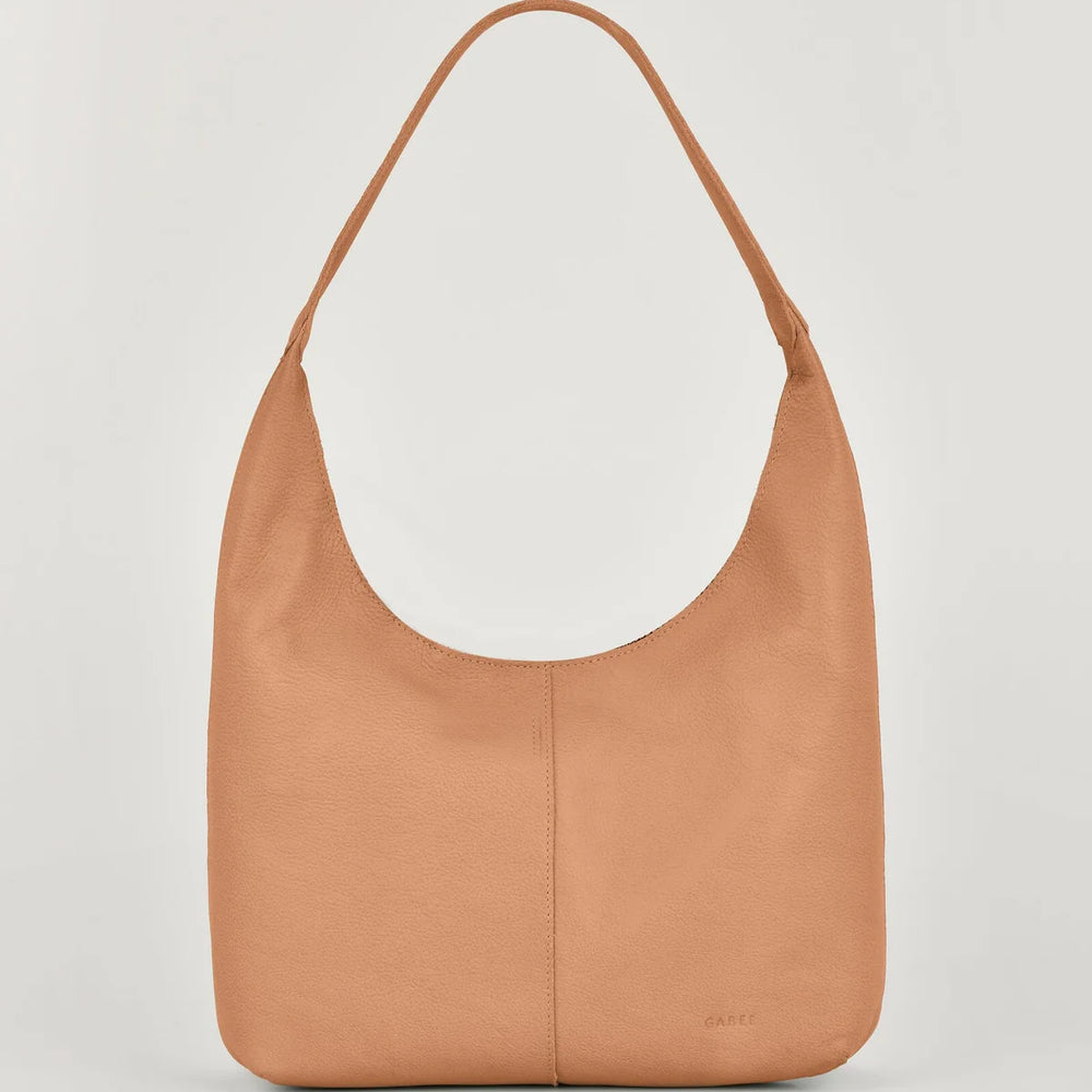 The Melissa shoulder bag is made of high-quality full-grain leather, which has been delicately buffed to create a soft and luxurious surface.