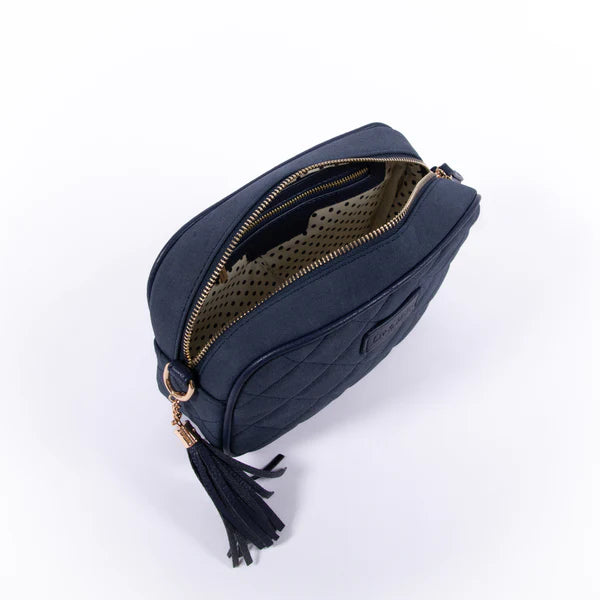 The Liv & Milly Sally in Navy suede is a classic & versatile crossbody bag crafted from a gorgeous soft vegan leather.