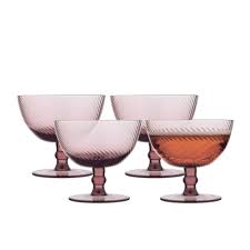 Diagonal ridging wraps itself around the Aveline glassware creating a mesmerising visual and tactile effect.