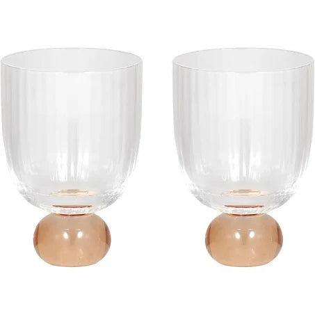 Add a modern yet elegant touch to your next dinner party with our Giselle Ribbed Goblet Glasses.