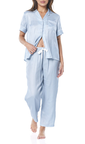 The Aileen Blue Satin Crop Pant PJ is an elegant and luxurious loungewear set that combines comfort with a touch of sophistication, making it perfect for relaxing in style.