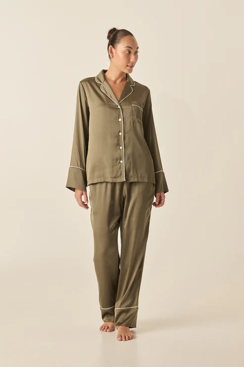 The Luella pyjama set in Olive by Gingerlilly. Crafted from sustainable 100% recycled polyester, it offers eco-conscious comfort.