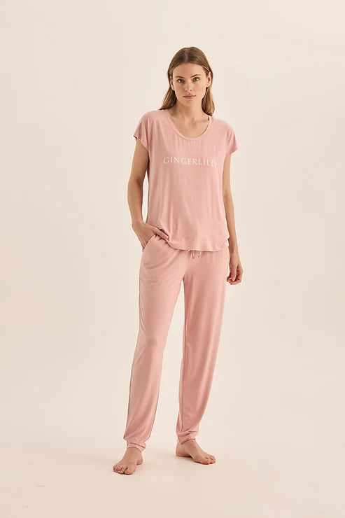 The Elara pyjama set in pink by Gingerlilly. Discover the ultimate in relaxation with our fashionable pink bamboo pyjama set.